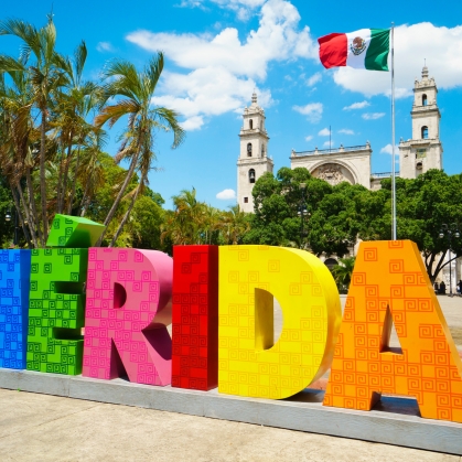 Image of large letter cutouts that read Merida