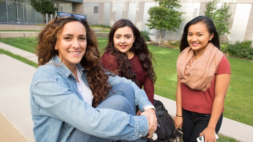Three students relaxing