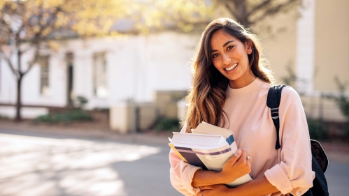 Student holding books