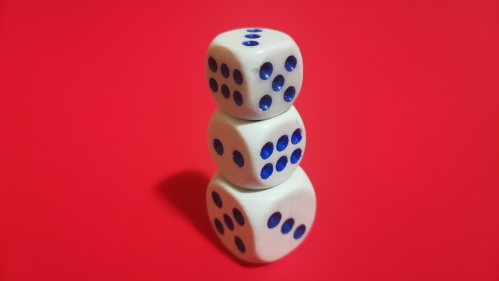 Red background with three dice