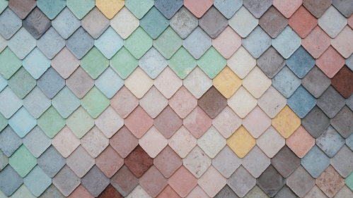 tiled background of pastel and muted colors
