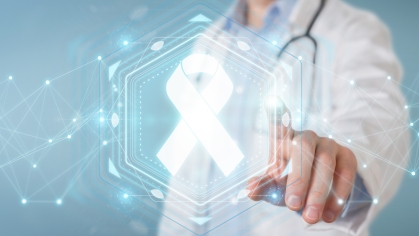 stock image of cancer ribbon and doctor person standing in the background
