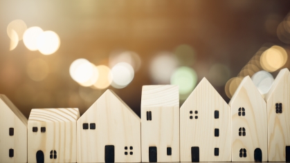 Stock image of row of wooden houses