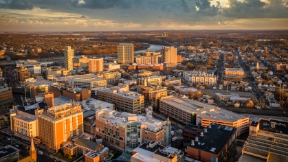 Drone photo of the city of New Brunswick at dusk
