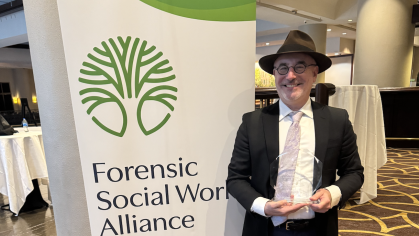 George Leibowitz with award