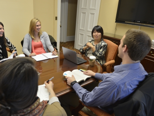 Students at round table discussion