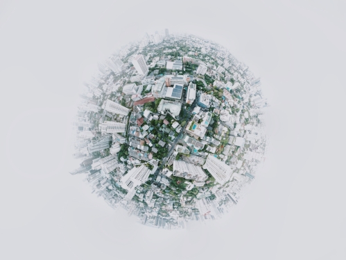 A digital image of the globe with buildings and structures extending from it